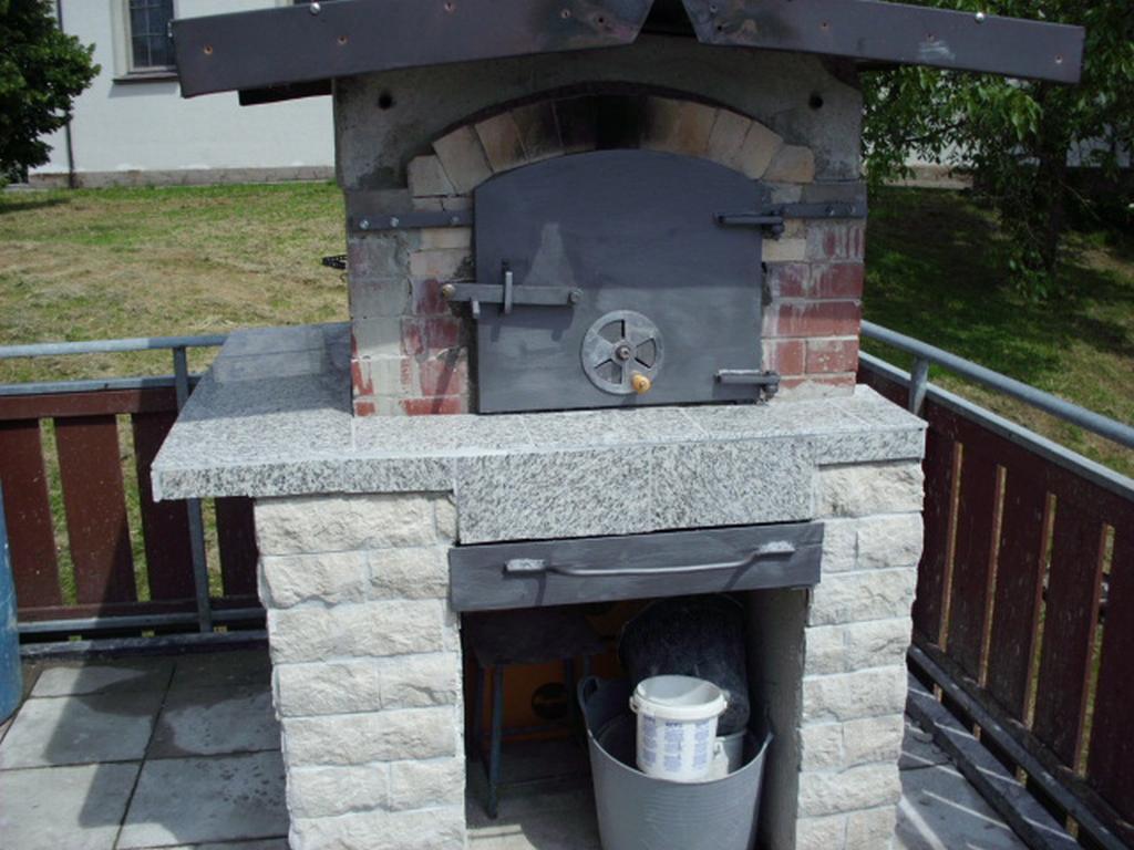 Ascheschublade eingepasst